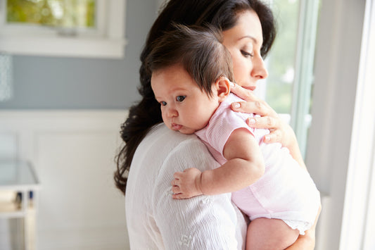 Why Do Babies Spit Up and What Can We Do About It?